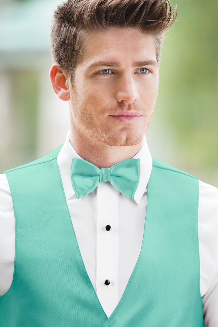 Guy wearing the Expressions Aqua Bow Tie and matching vest