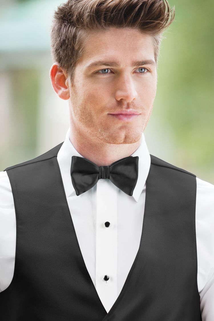 Guy wearing the Expressions Black Bow Tie and matching vest