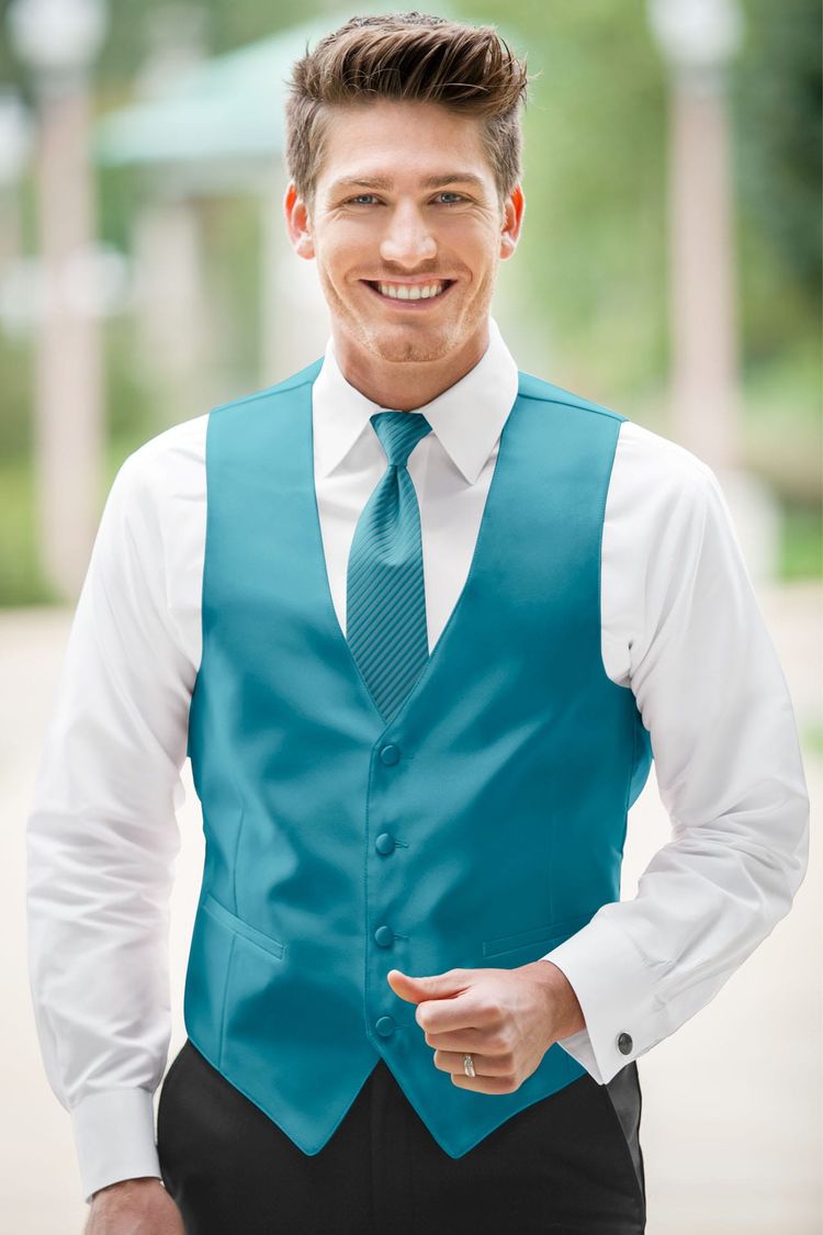 Guy wearing the Expressions Malibu Fullback Vest and matching tie