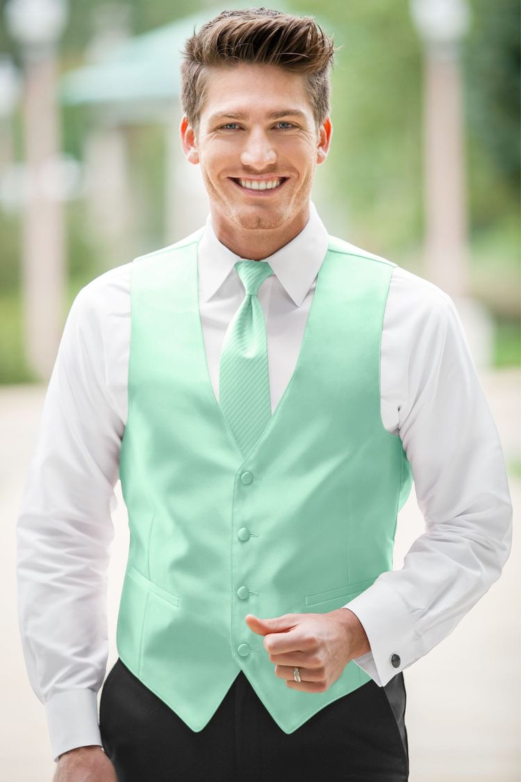 The groom wearing the Expressions Mint Fullback Vest