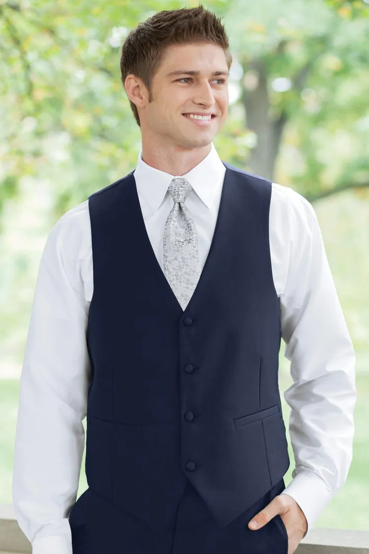 Guy wearing a Matching Navy Fullback Vest with a floral silver tie