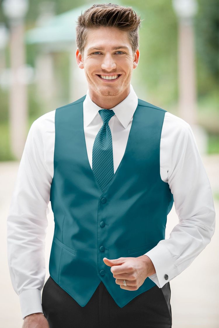 Guy wearing the Expressions Teal Fullback Vest and matching tie
